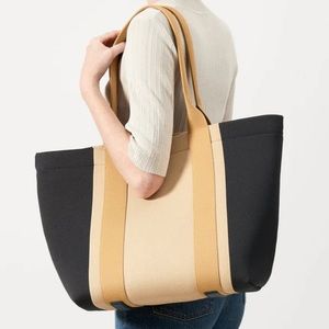 EUC Ink and Ivory Rothy’s essential tote with magnets